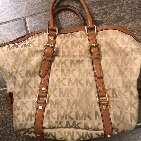 Michael Kors Handbags - Authentic Michael Kors monogrammed purse